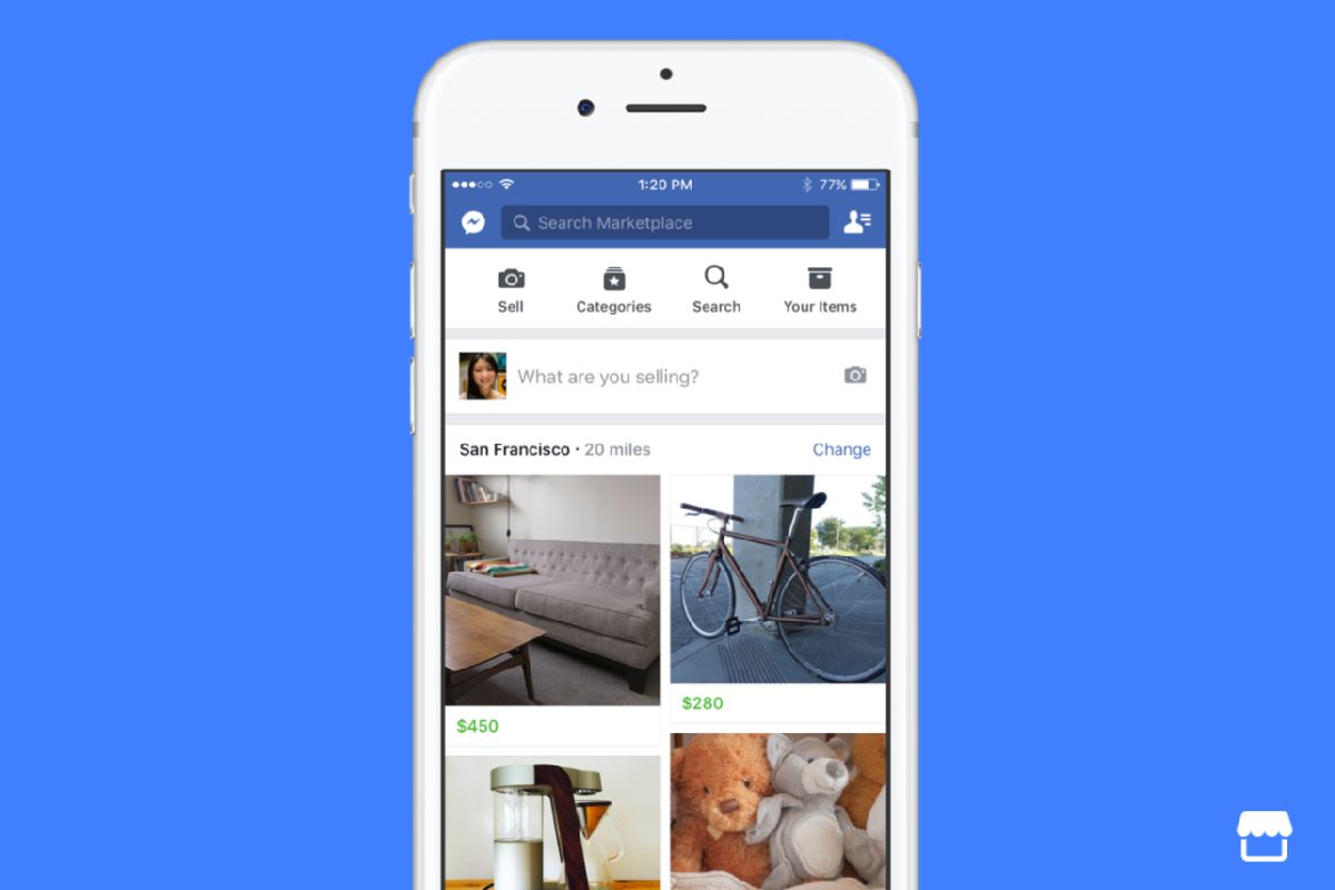 Iphone bianco su sfondo azzurro con l'app di Facebook Marketplace